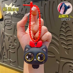Móc khóa mèo đen mắt nồi