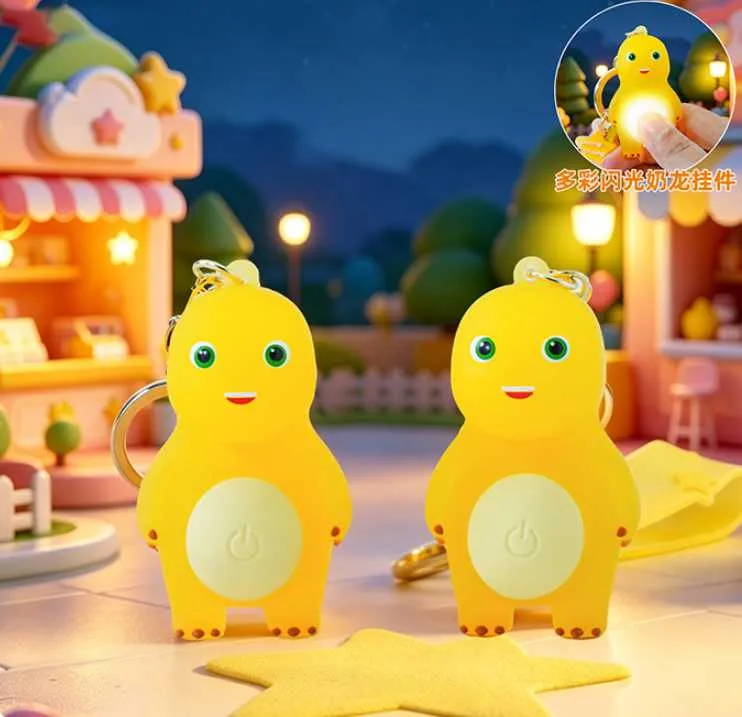 Móc khóa khủng long vàng bụng có đèn